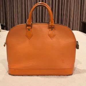 Classic orange Louis Vuitton Epileather Alma bag